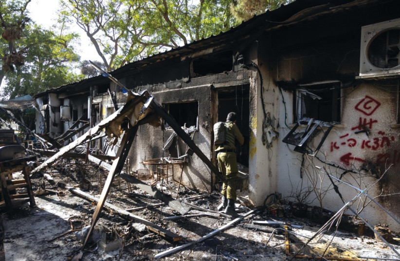  Kibbutz Nir Oz after the massacre (credit: Chaim Goldberg/Flash90)